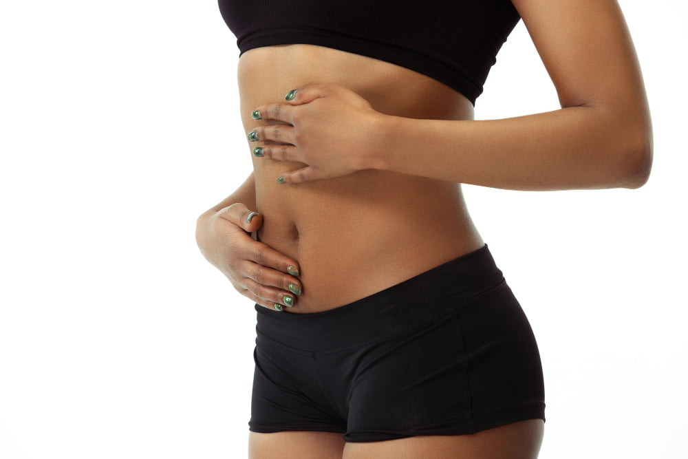 Como acabar com a pochete da barriga 3 eating nutrition stomach pain slim tanned woman s belly white wall african american model with well kept shape skin beauty self care weight loss fitness slimming concept
