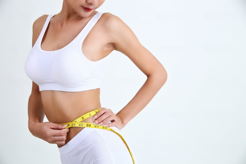 Como acabar com a pochete da barriga 4 young woman with beautiful body measure tape