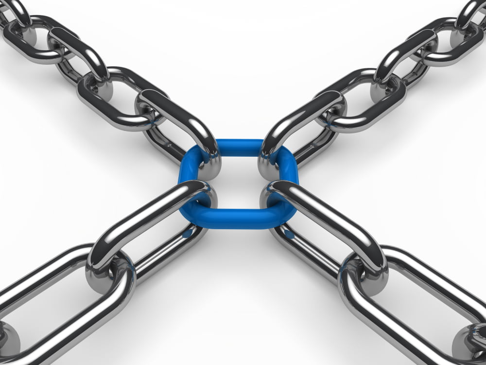 Por que o link building ainda é relevante para o SEO em 2024? 3 four chains pulling blue link